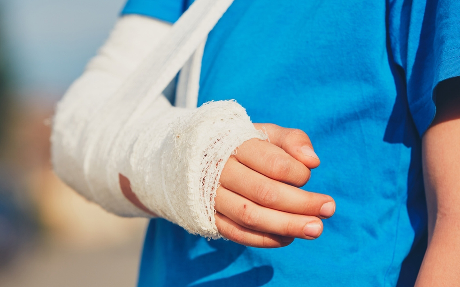 an image of a child with an injured arm
